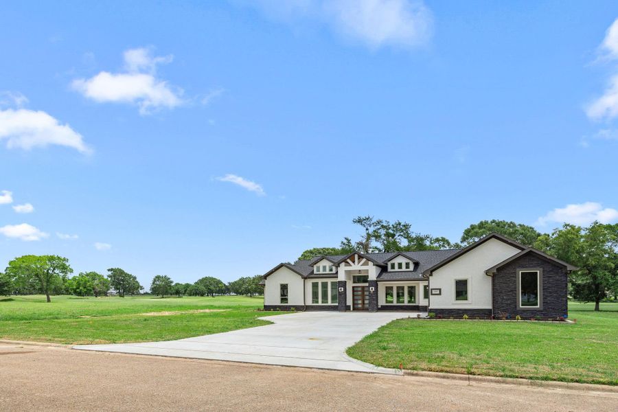 Front exterior of a new home in , Hempstead, TX, highlighting curb appeal (Image 2). Front exterior of a new home in , Hempstead, TX, highlighting curb appeal (Image 2).