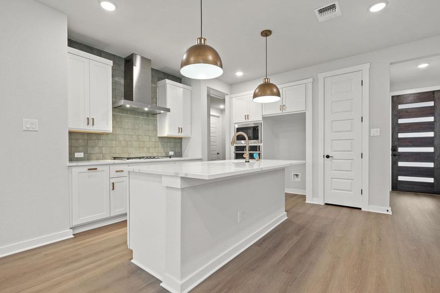 Furnished interior view inside a new home in Flora, Hutto (Image 6).