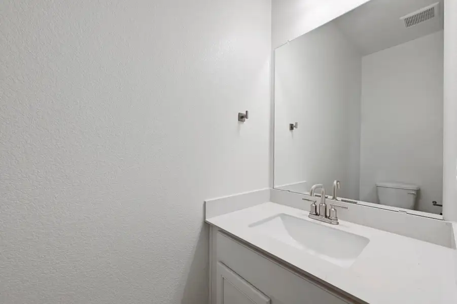 Furnished interior view inside a new home in Creekside at Estancia, Austin (Image 6). Furnished interior view inside a new home in Creekside at Estancia, Austin (Image 6).