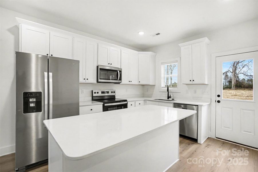 Furnished interior view inside a new home in , Monroe (Image 5).