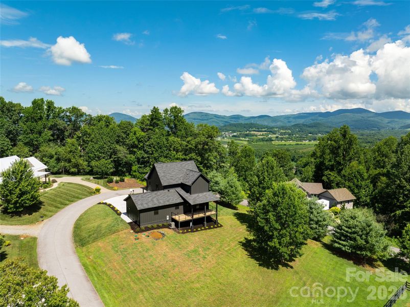 Front exterior of a new home in , Hendersonville, NC, highlighting curb appeal (Image 25). Front exterior of a new home in , Hendersonville, NC, highlighting curb appeal (Image 25).