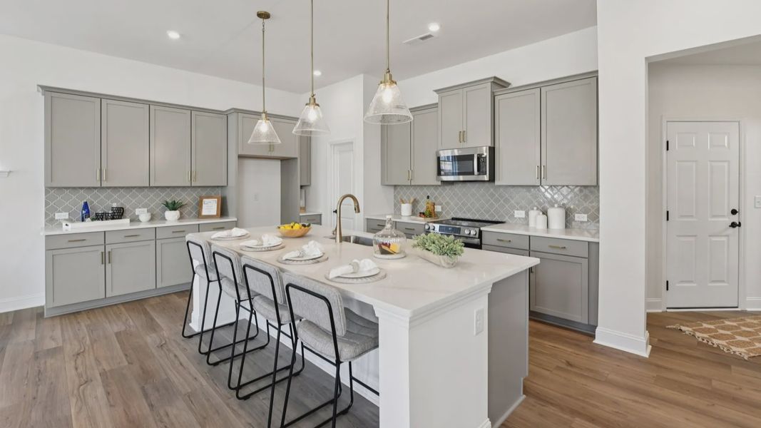 The Brentwood Plan by DRB Homes in The River District, Charlotte NC. - Kitchen