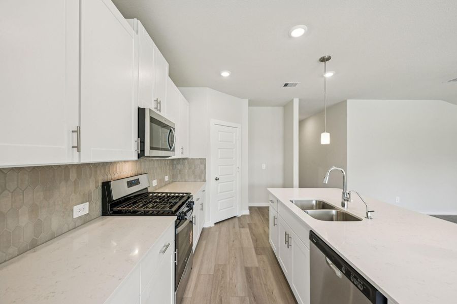 Furnished interior view inside a new home in Landing Meadows - Premier Series, New Caney (Image 7). Furnished interior view inside a new home in Landing Meadows - Premier Series, New Caney (Image 7).