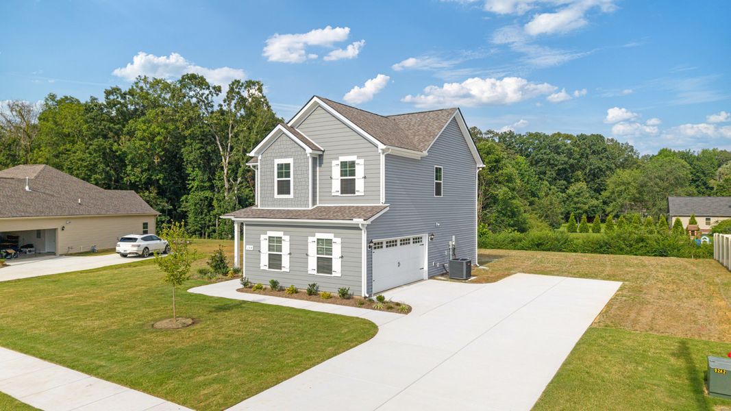 Front exterior of a new home in Stillwater, Tullahoma, TN, highlighting curb appeal (Image 21).