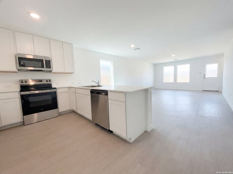 Furnished interior view inside a new home in Waters Edge, Seguin (Image 8).