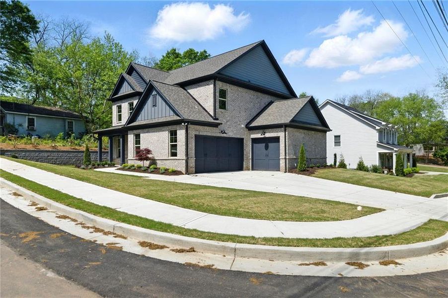 Front exterior of a new home in , Buford, GA, highlighting curb appeal (Image 1).
