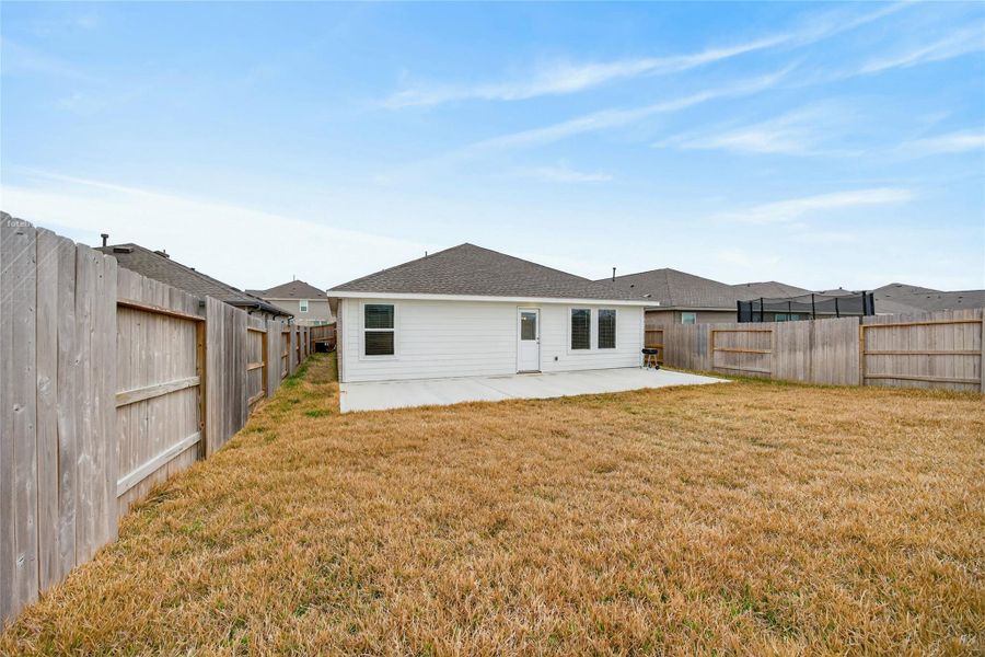 Exterior details and patio area of a home in Anniston, Katy (Image 22).