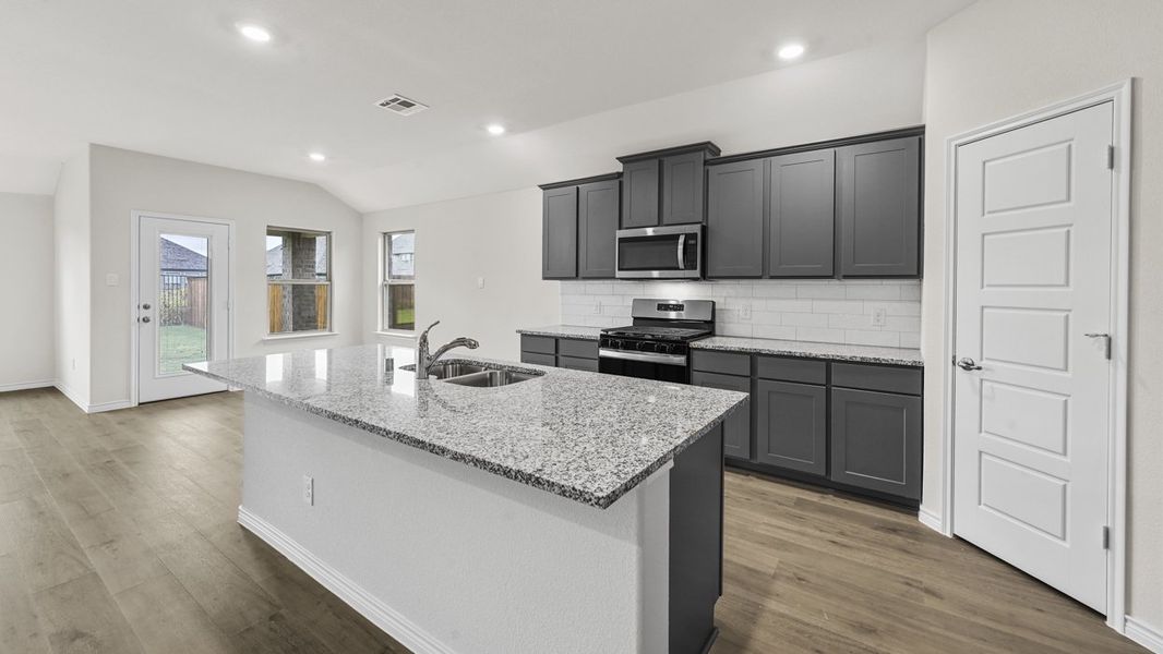 Representative furnished interior of a home built from the Bentworth by D.R. Horton in Elevon, Lavon (Image 4).