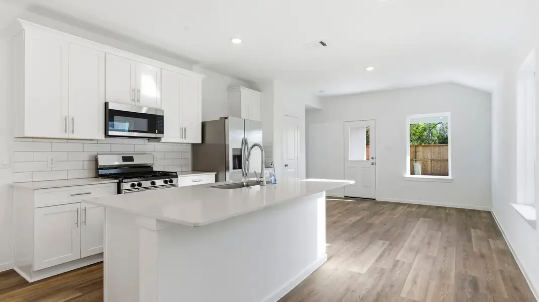 Furnished interior view inside a new home in Lakes at Westland Ranch, League City (Image 3).