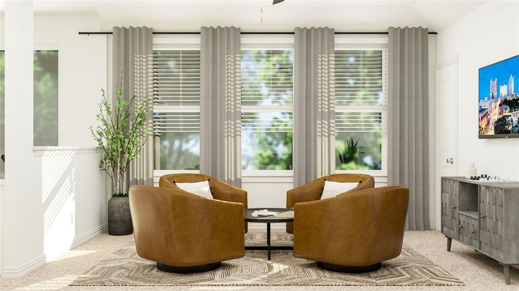 Sitting room featuring light carpet