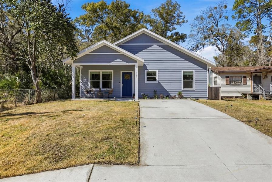 Front exterior of a new home in , Gainesville, FL, highlighting curb appeal (Image 22).