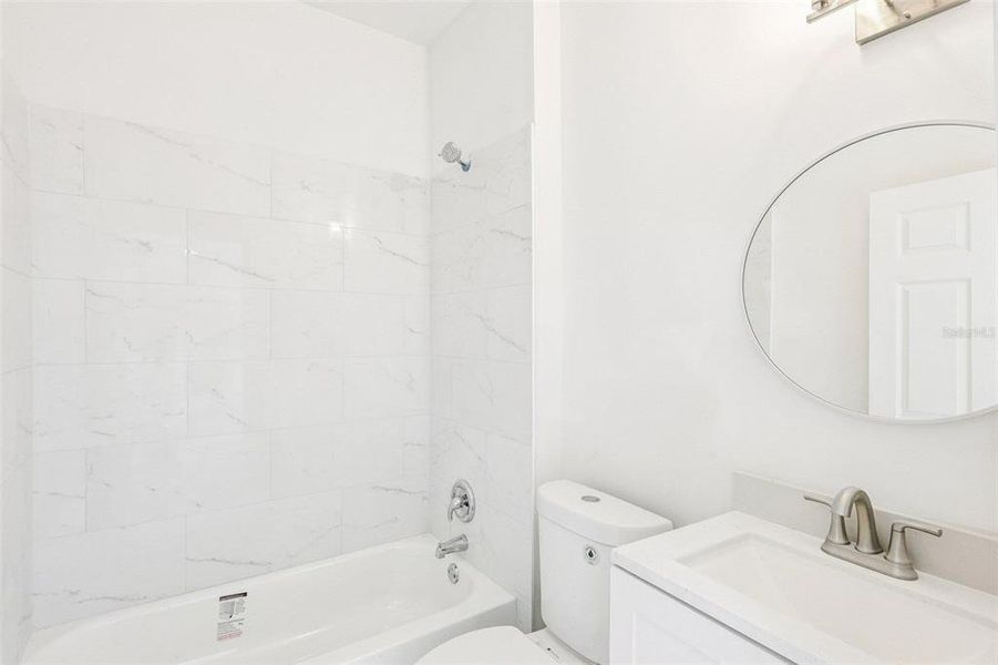 Furnished interior view inside a new home in , Port Charlotte (Image 9).