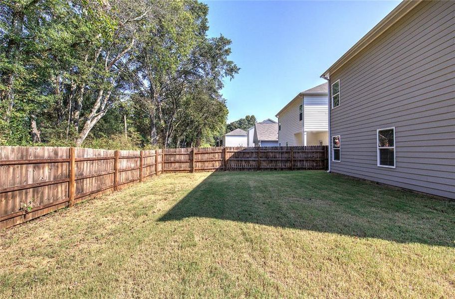 Exterior details and patio area of a home in , Cartersville (Image 25).