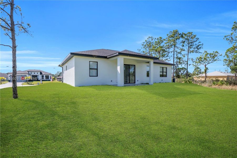 Exterior details and patio area of a home in , Lehigh Acres (Image 28).