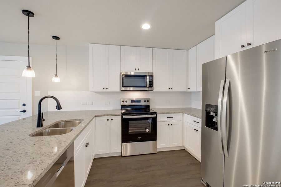 Furnished interior view inside a new home in , Lakehills (Image 9).