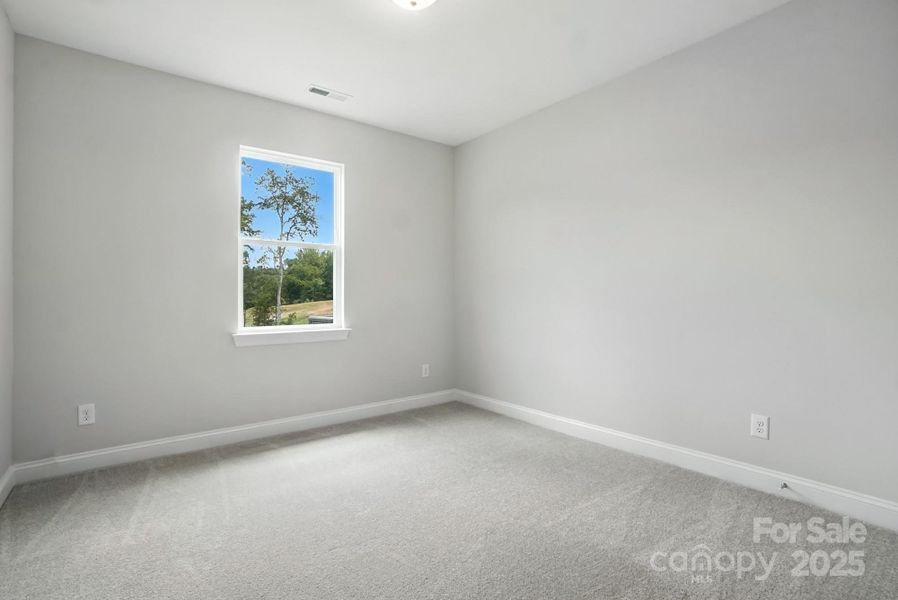 Spacious, unfurnished interior of a new home in Hampton Woods, Charlotte (Image 18).