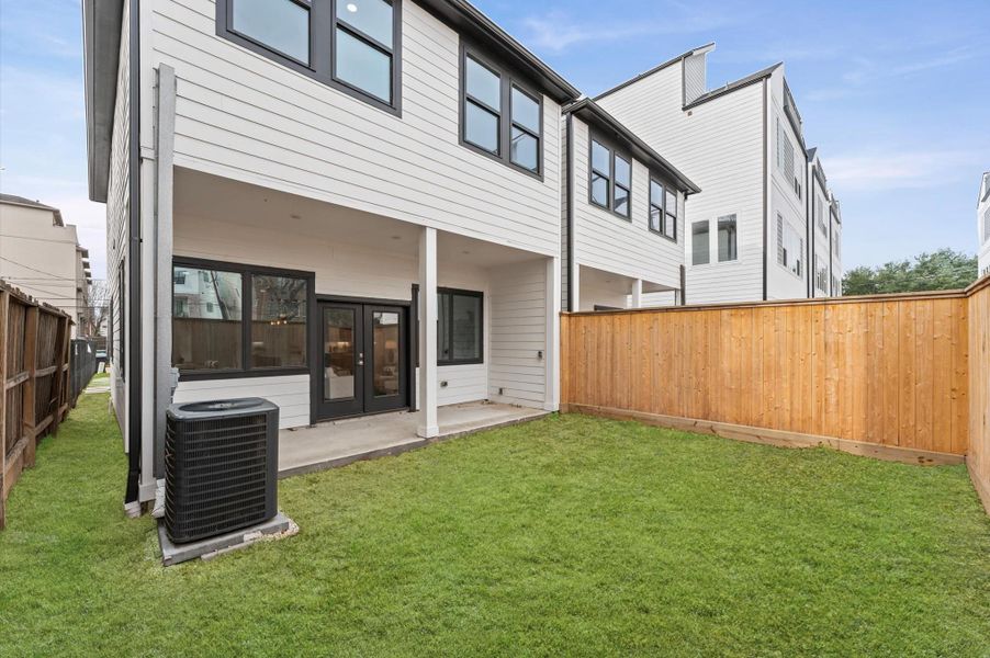 Exterior details and patio area of a home in , Houston (Image 3).