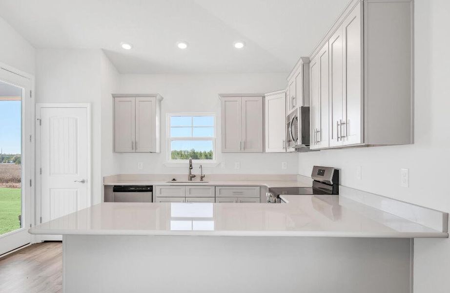 Furnished interior view inside a new home in The Bluffs at Lafayette, Freeport (Image 4).