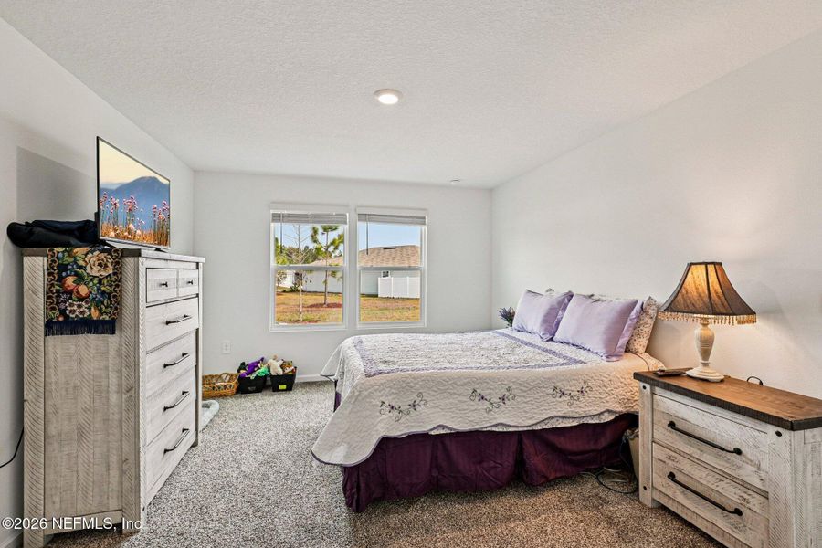 Furnished interior view inside a new home in Cross Creek Express, Green Cove Springs (Image 28).