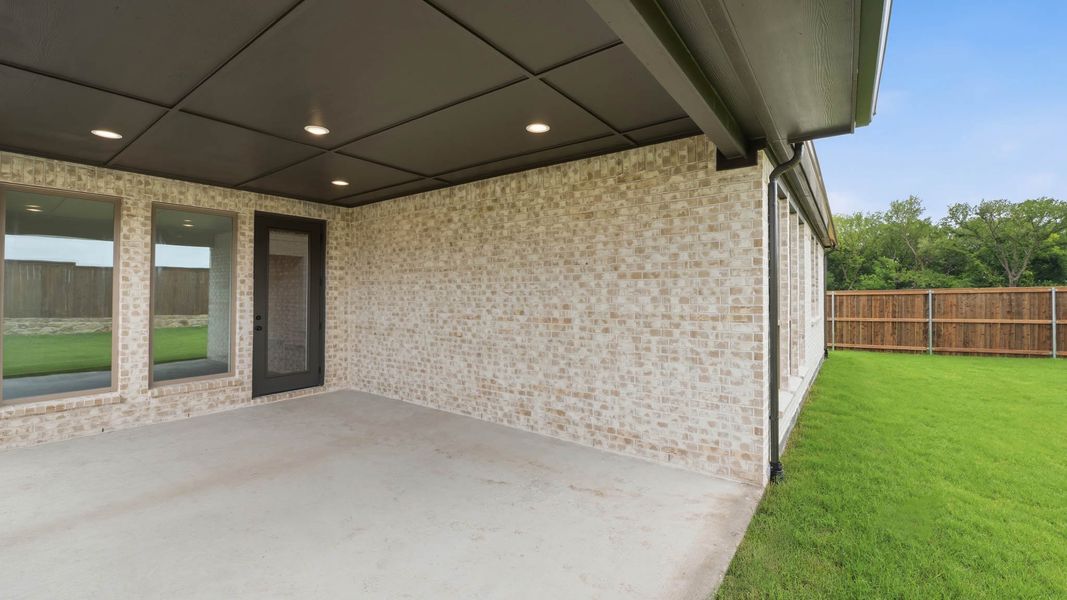 Exterior details and patio area of a home in The Parks at Wilson Creek, Celina (Image 3).
