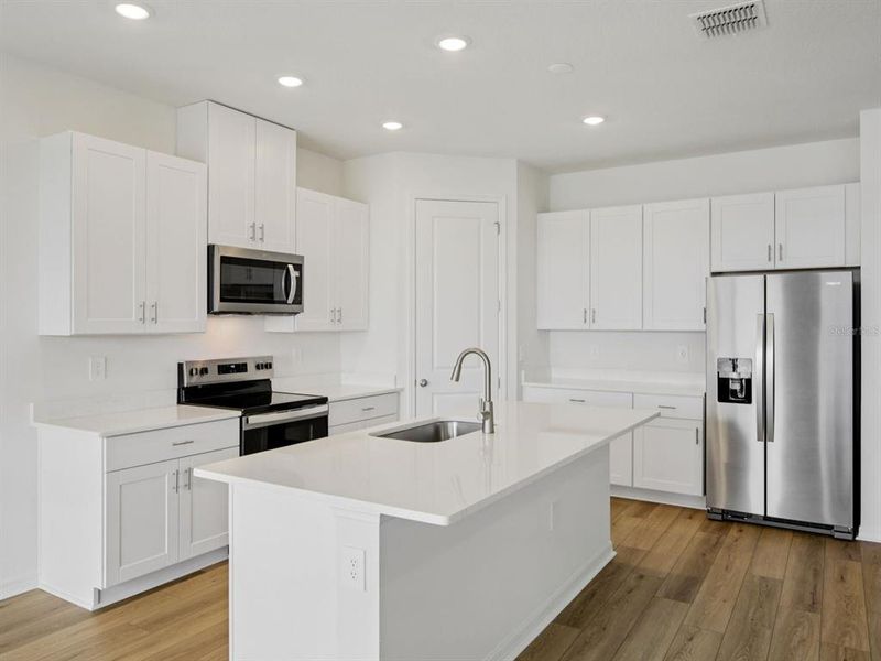Furnished interior view inside a new home in Coasterra - Reserve Series, Palmetto (Image 7).