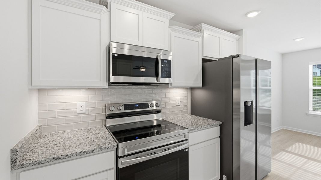 Furnished interior view inside a new home in Wheatfield, Shelbyville (Image 6).