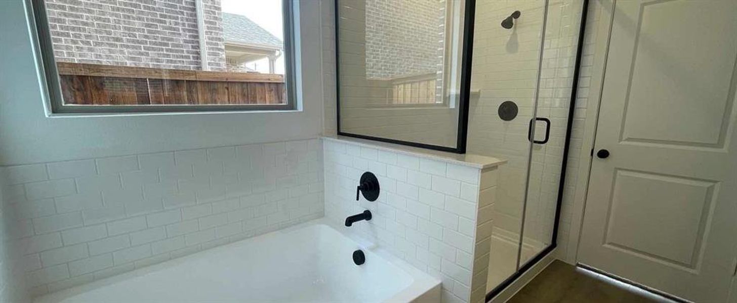 Primary Bathroom Construction Progress featuring the Noir Collection