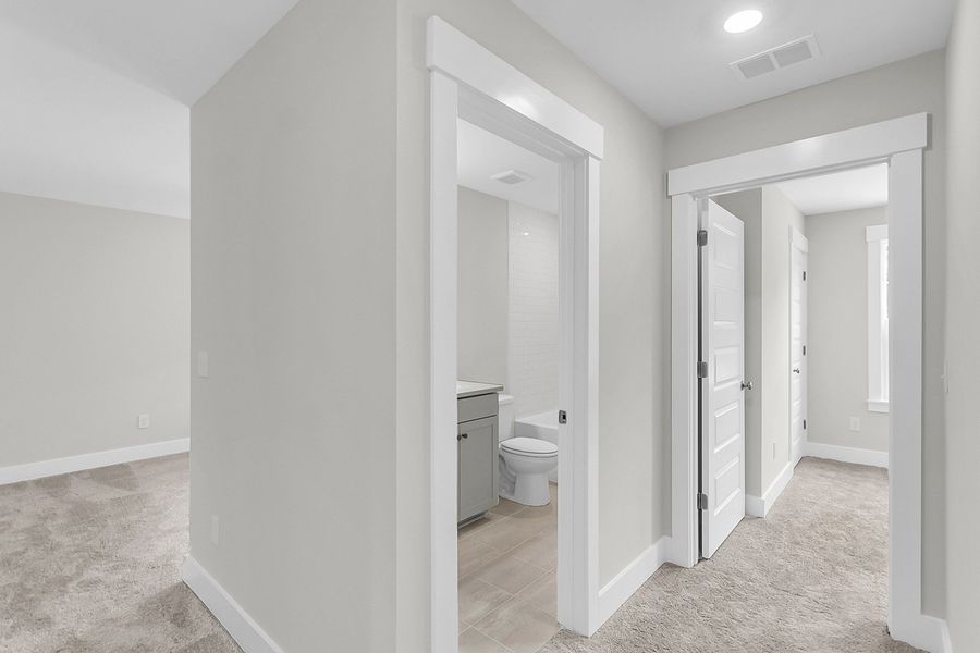 Spacious, unfurnished interior of a new home in Pineland Preserve, Summerville (Image 48).
