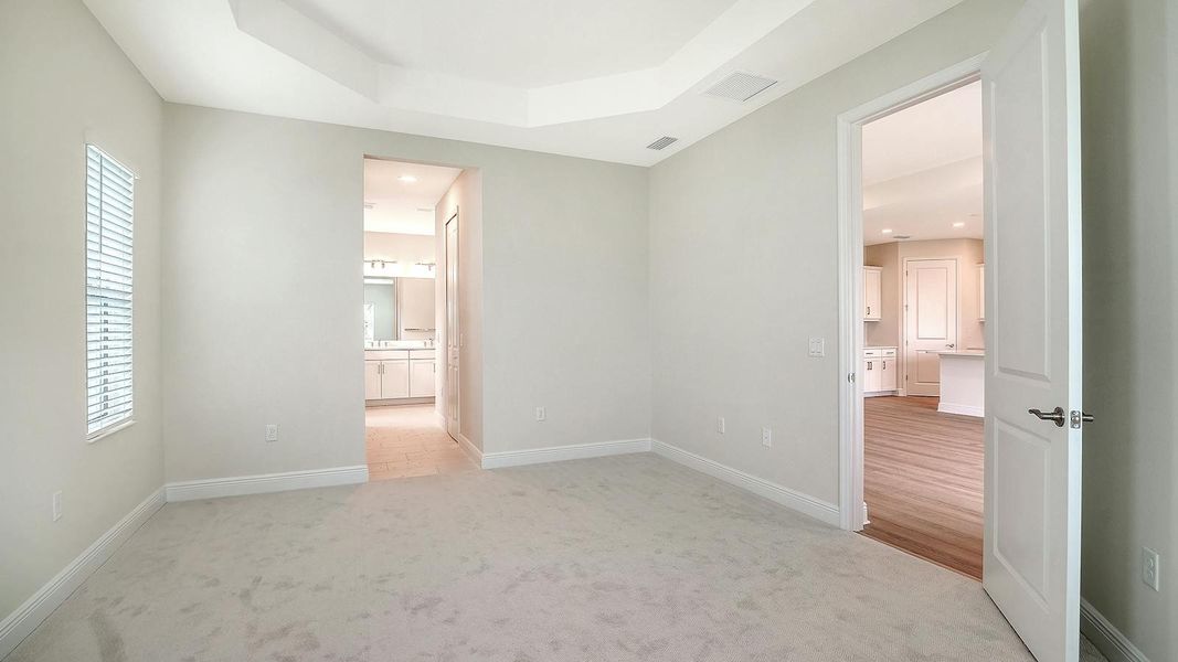 Spacious, unfurnished interior of a new home in Wildleaf Real Estate and Homes for Sale in Parrish, FL - Neal Communities, Parrish (Image 13).