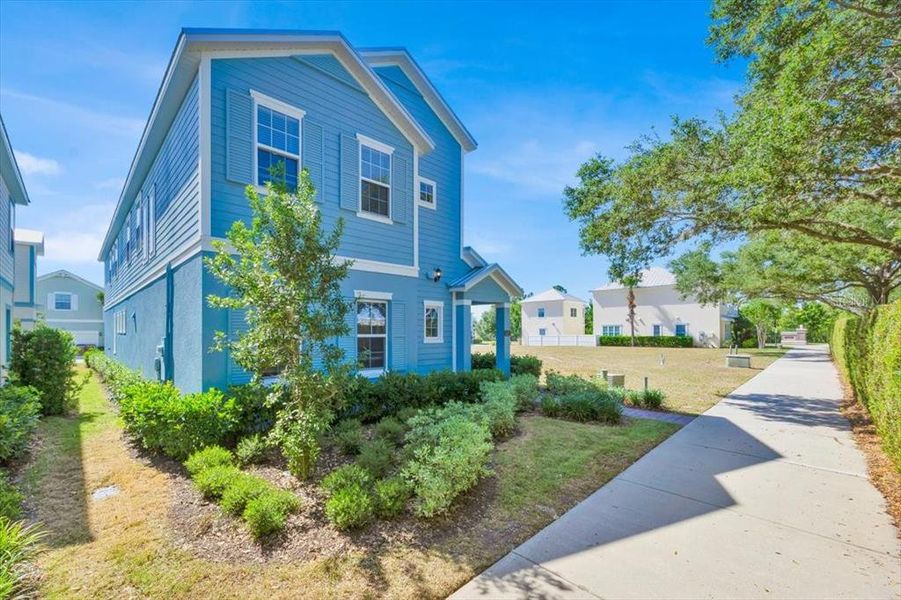 Front exterior of a new home in , Reunion, FL, highlighting curb appeal (Image 18).