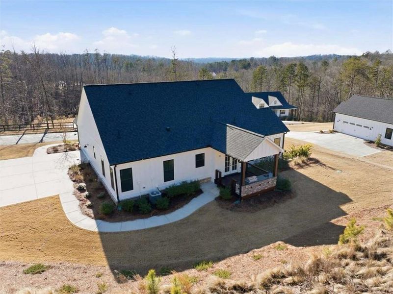 Front exterior of a new home in , Ball Ground, GA, highlighting curb appeal (Image 31). Front exterior of a new home in , Ball Ground, GA, highlighting curb appeal (Image 31).