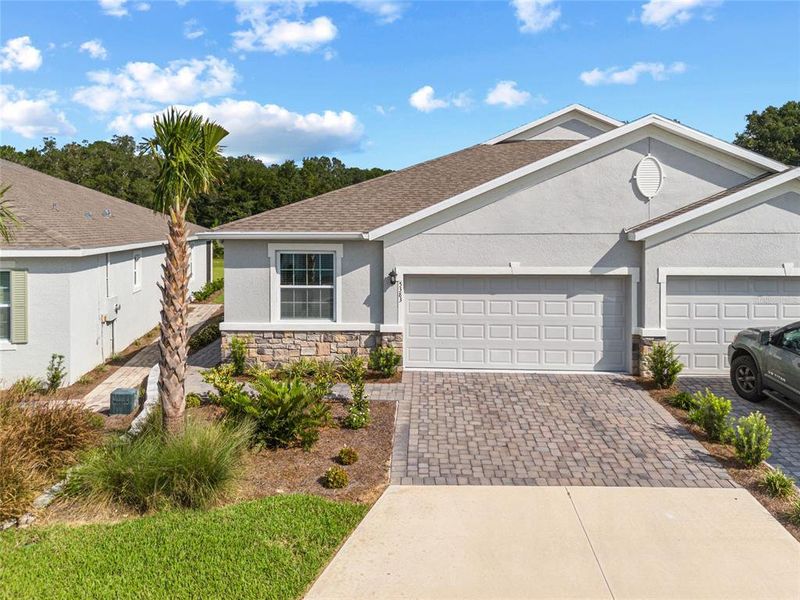 Front exterior of a new home in , Ocala, FL, highlighting curb appeal (Image 1). Front exterior of a new home in , Ocala, FL, highlighting curb appeal (Image 1).