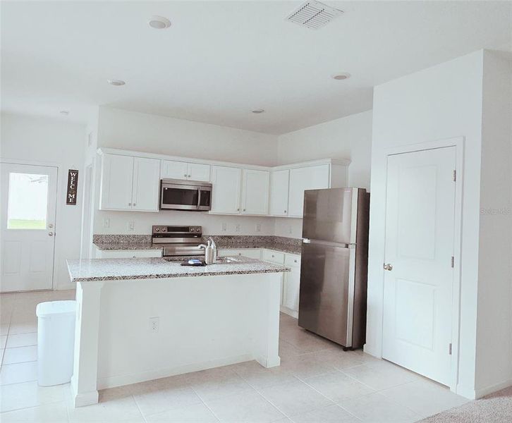 Furnished interior view inside a new home in , Haines City (Image 4).
