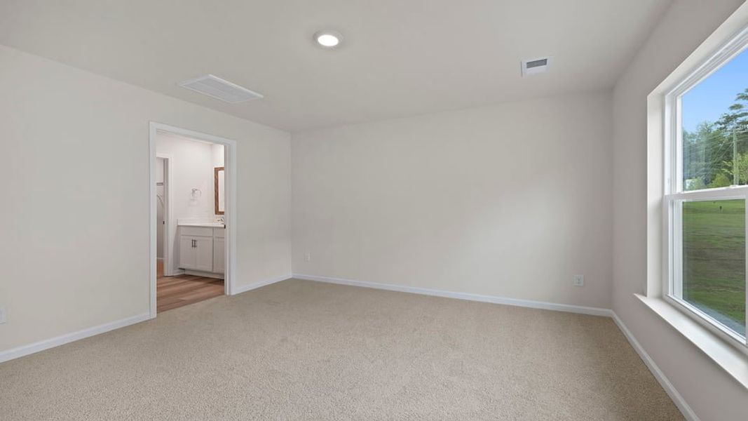 Spacious, unfurnished interior of a new home in Bentley Park, Greenwood (Image 17).