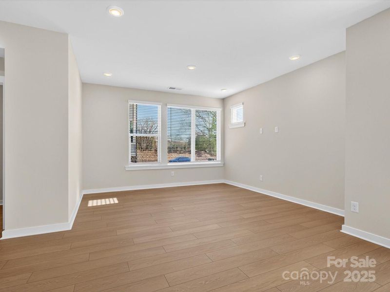 Spacious, unfurnished interior of a new home in Central Living at Craig, Charlotte (Image 15).