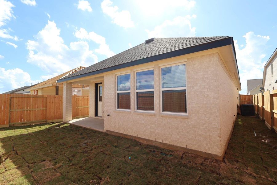 Backyard with covered patio Backyard with covered patio