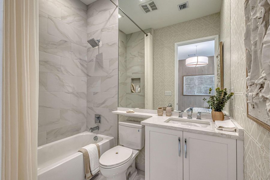 Furnished interior view inside a new home in Apex at Avenir, Palm Beach Gardens (Image 70).