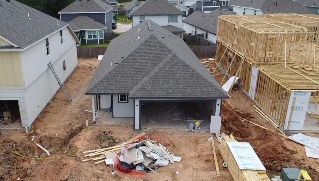 In-progress construction of a new home in Ridgeland Hills, Willis, TX (Image 24).