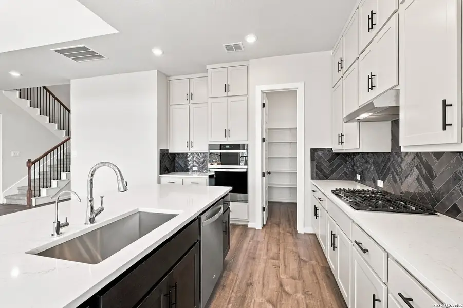 Furnished interior view inside a new home in Windsong, Boerne (Image 7).