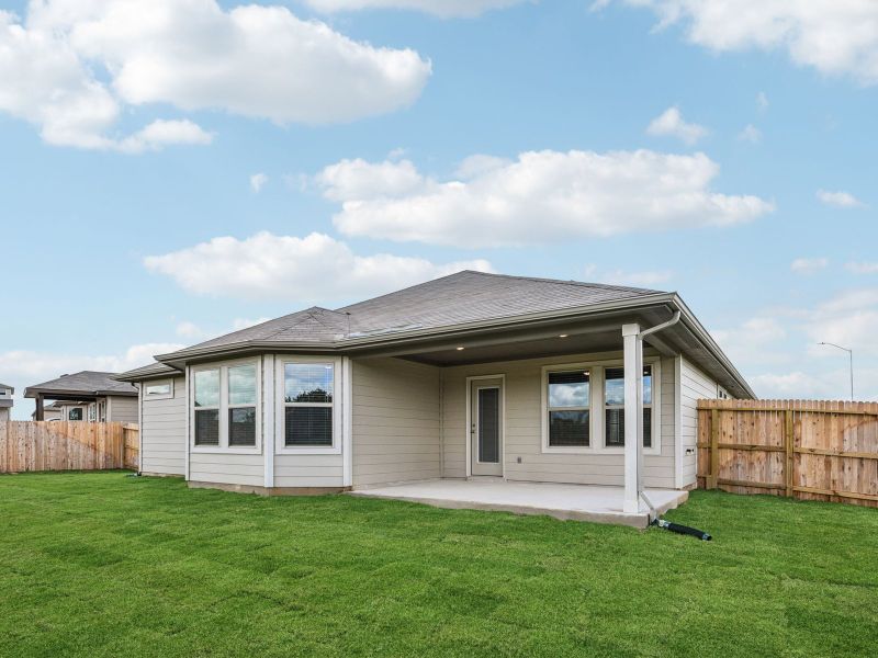 Back exterior of the Oleander floorplan at a Meritage Homes community.