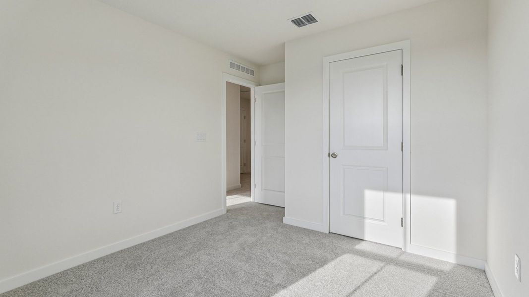 Furnished interior view inside a new home in Cyrene at Harmony, St. Cloud (Image 18).