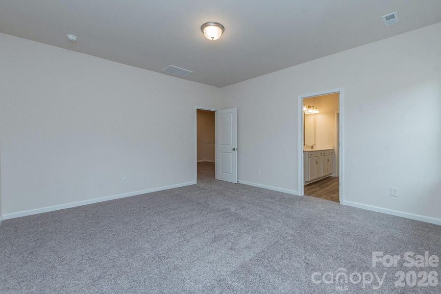 Spacious, unfurnished interior of a new home in Country Club Village, Salisbury (Image 22).