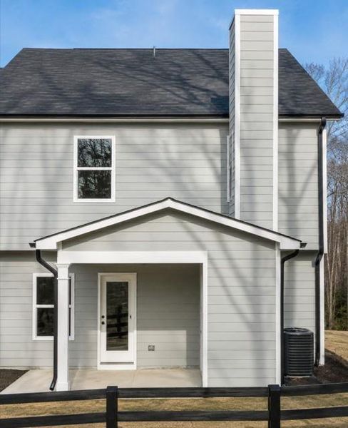 Front exterior of a new home in , Tucker, GA, highlighting curb appeal (Image 1). Front exterior of a new home in , Tucker, GA, highlighting curb appeal (Image 1).
