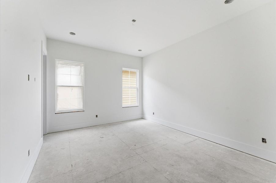 Secondary upstairs bedroom.