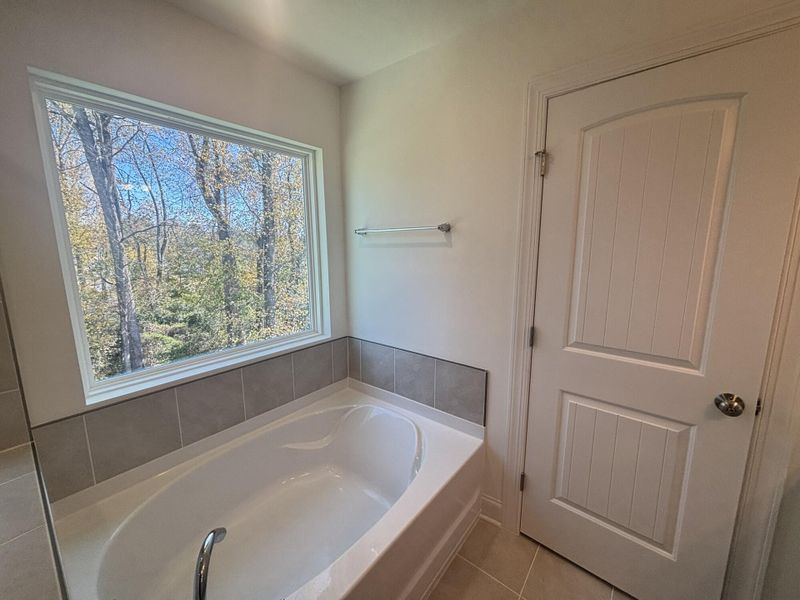 Furnished interior view inside a new home in Daniel Farms, Benson (Image 10).