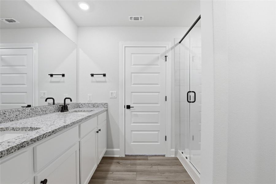 Furnished interior view inside a new home in Whisper Valley, Manor (Image 10).