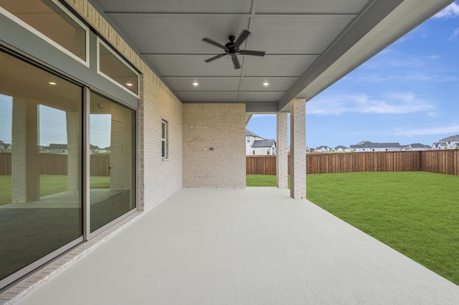 Exterior details and patio area of a home in Northshore at Lakewood Village - Estate Series, Lakewood Village (Image 4).