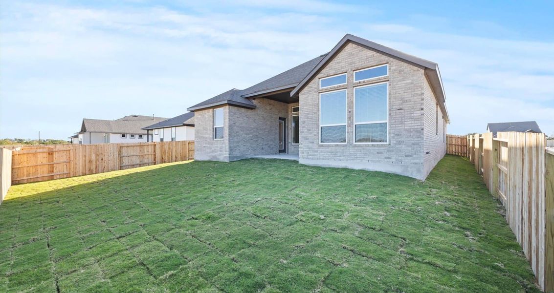 Exterior details and patio area of a home in Village at Three Oaks, Seguin (Image 4). Exterior details and patio area of a home in Village at Three Oaks, Seguin (Image 4).
