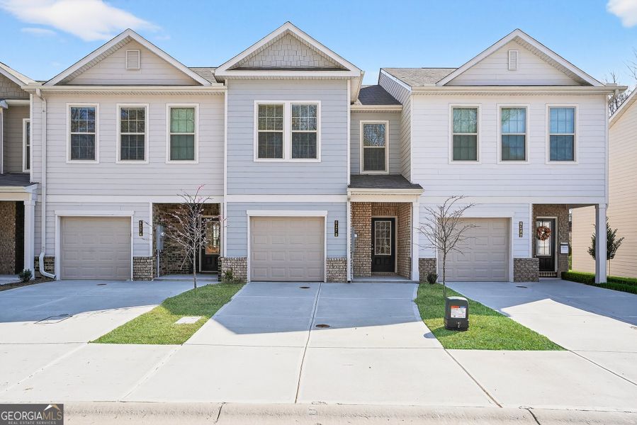 Front exterior of a new home in Morning Creek Forest, Atlanta, GA, highlighting curb appeal (Image 1). Front exterior of a new home in Morning Creek Forest, Atlanta, GA, highlighting curb appeal (Image 1).