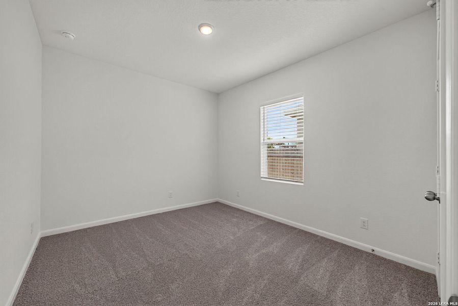 Spacious, unfurnished interior of a new home in Hennersby Hollow, San Antonio (Image 14).